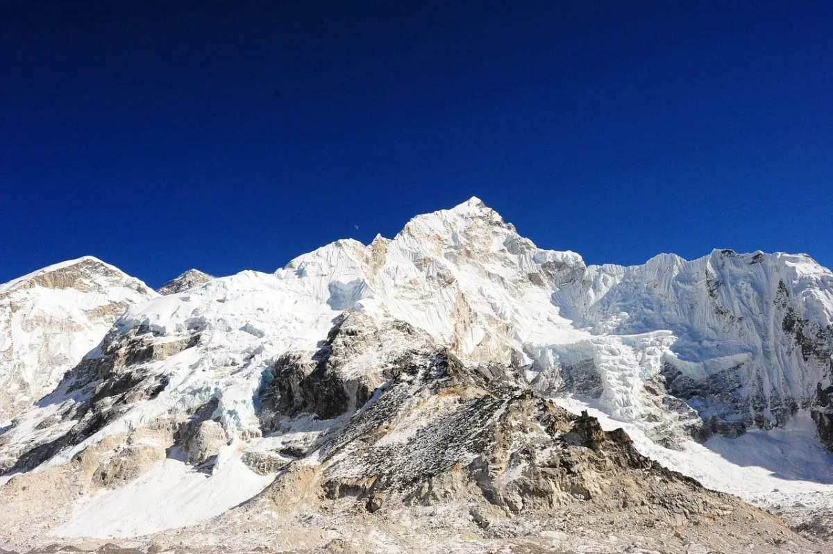 Mount Everest summit pyramid towering over the Himalaya