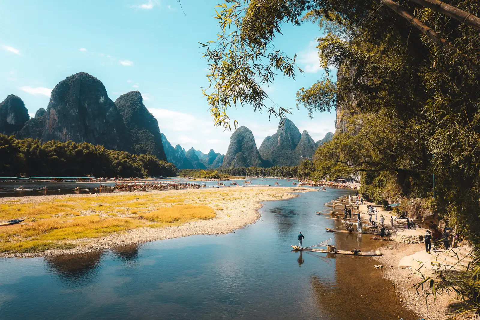 Guilin karst towers rising from mist over the river valley