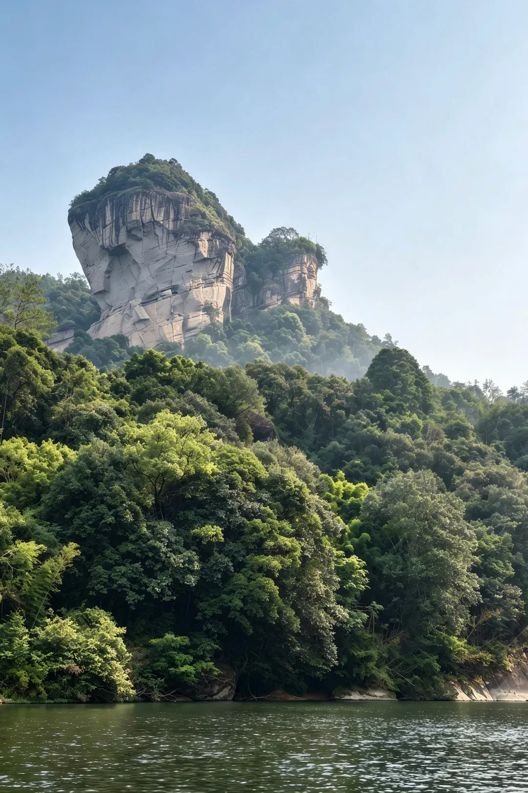 Nine-Bend River winding through Wuyi Mountain cliffs with bamboo rafts